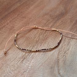 Armband guld/burgundy