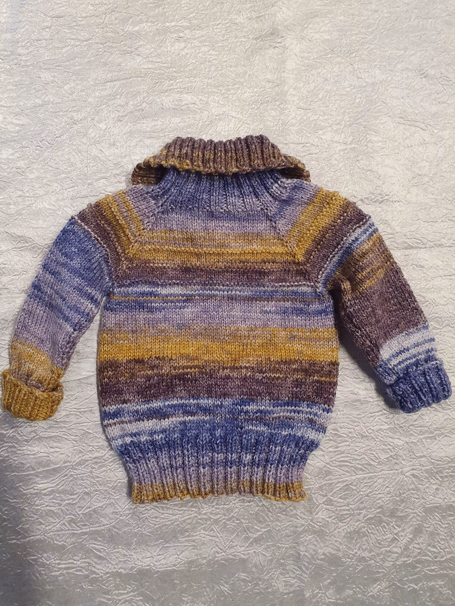 Babykofta  sorlek ca 68