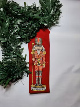 Juleröda servetter med nötknäpparen