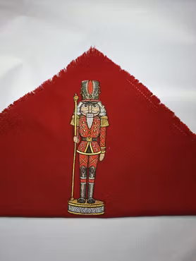 Juleröda servetter med nötknäpparen