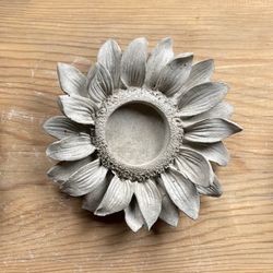 Blomma med plats för värmeljus