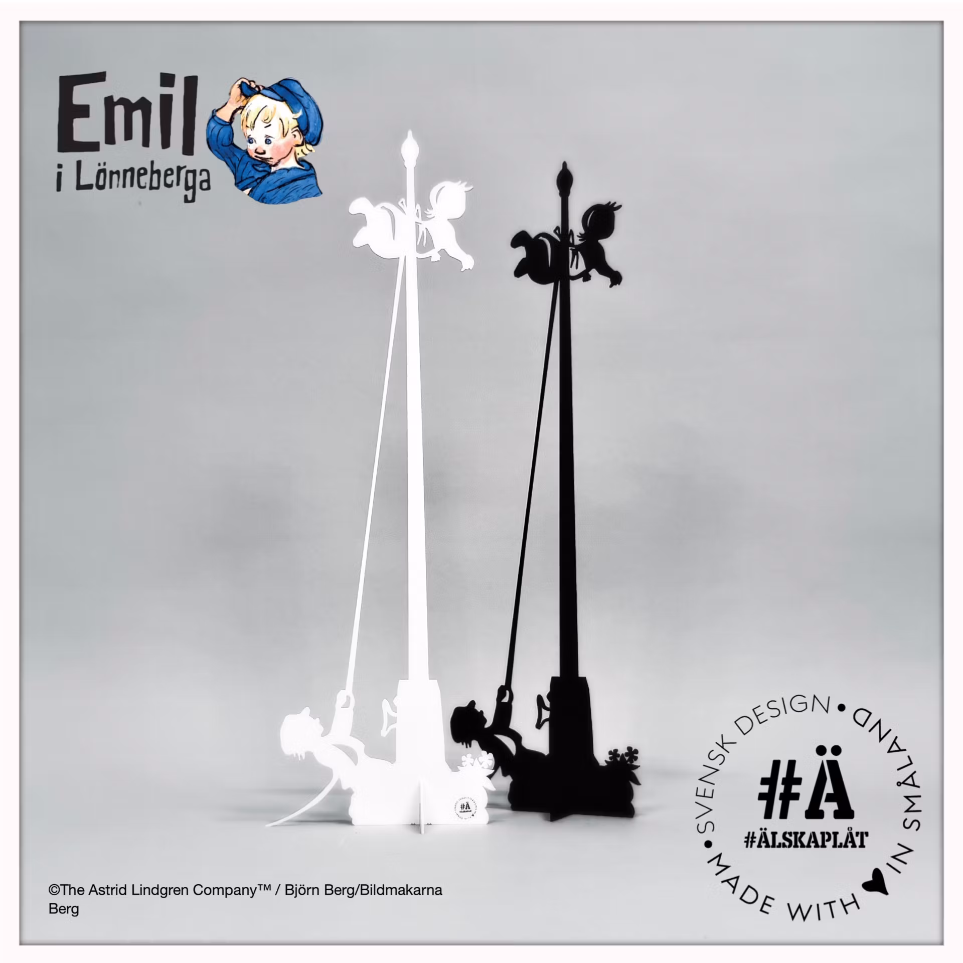 Emil hisst Ida am Fahnenmast