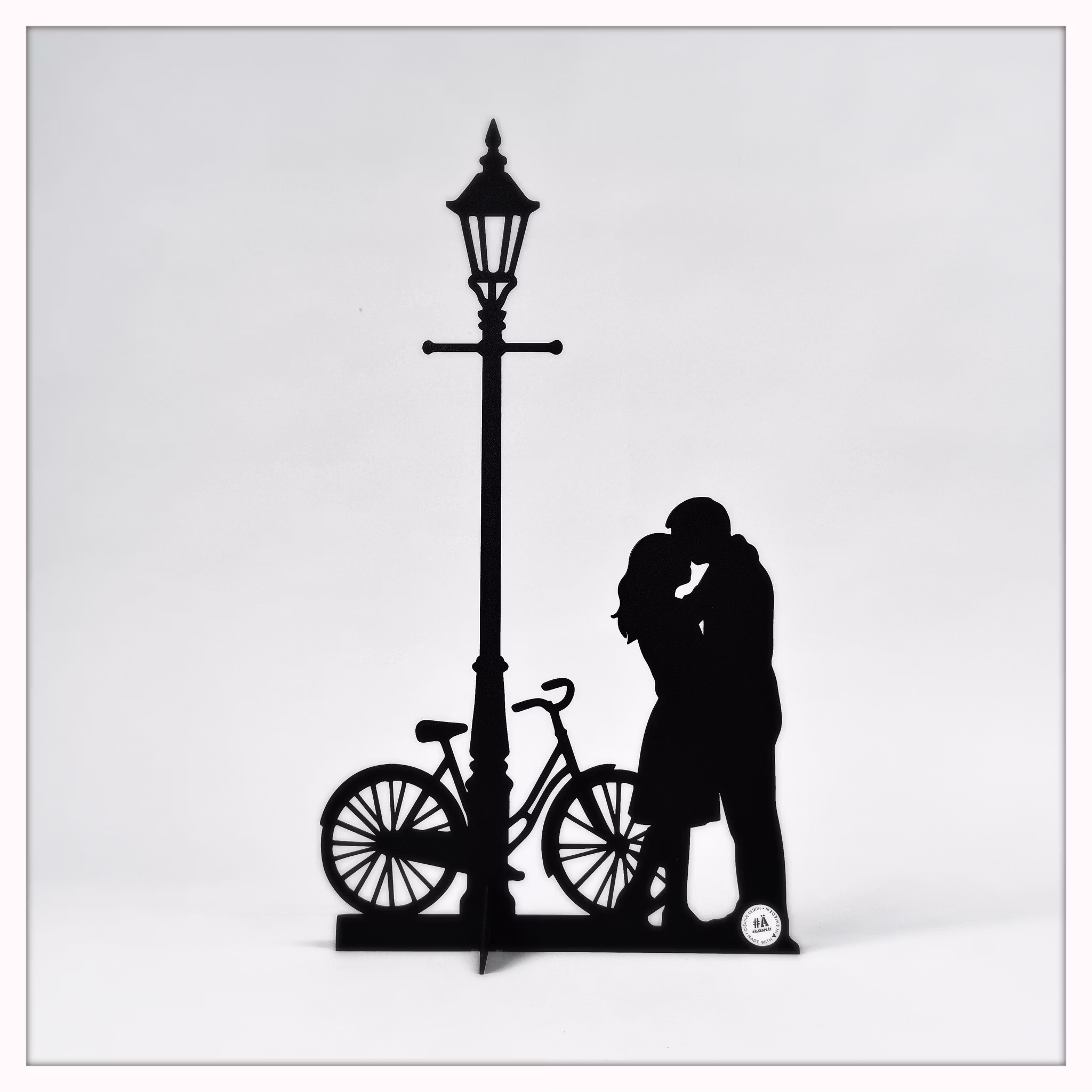 Loving couple under street lamp