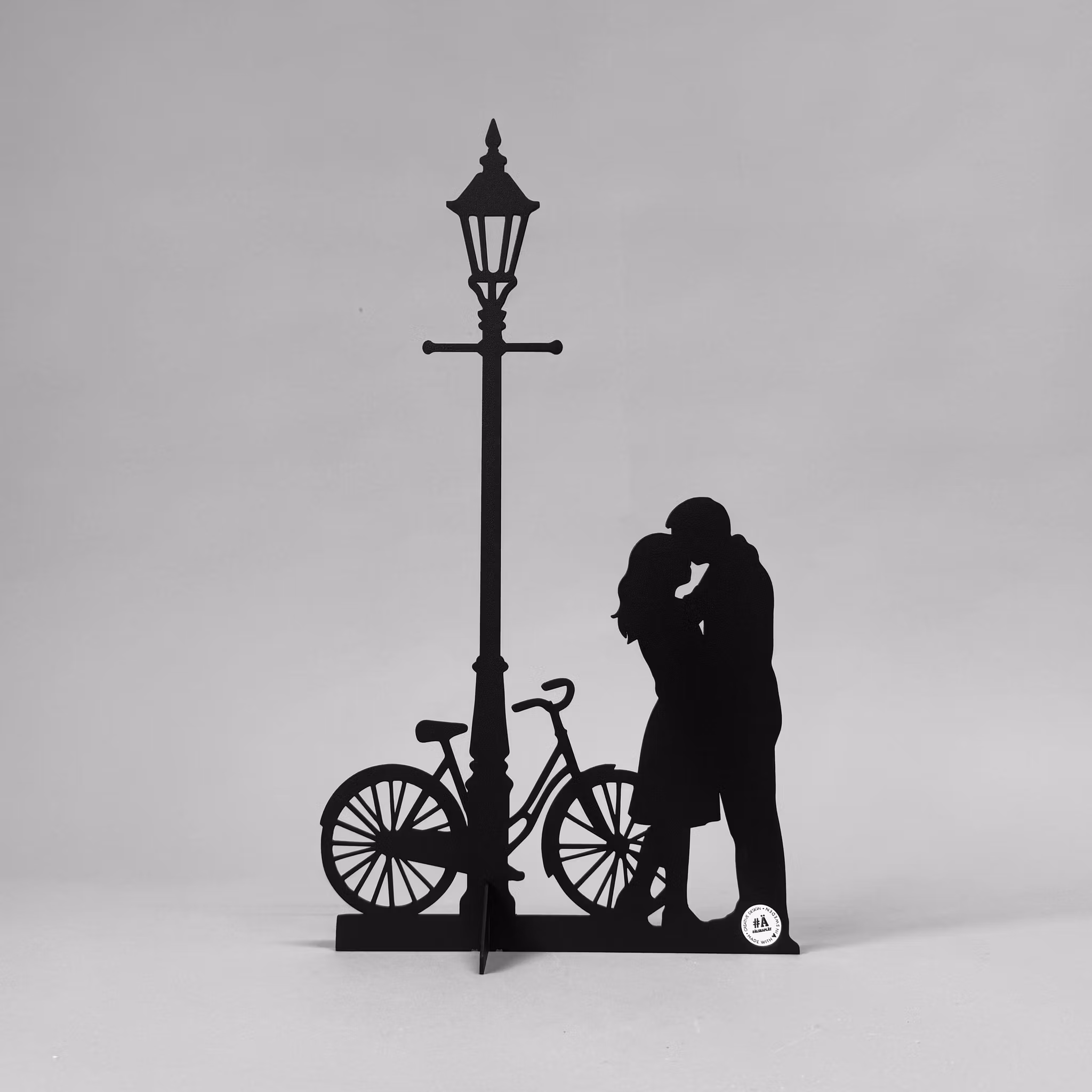 Loving couple under street lamp