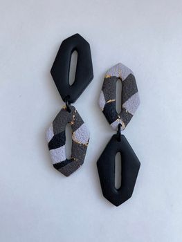 Pieces (mattsvart/mönster)