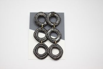 Uneven circle (glitter/svart)