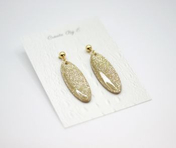 Oval (guld/glitter)