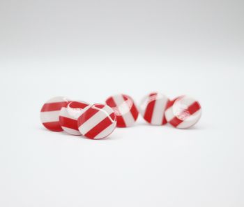 Röd/vita studs gloss