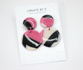 Glossy circle (rosa/svart melerad)