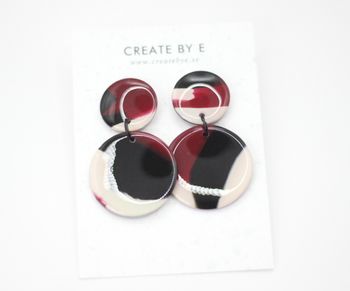 Glossy circle (svart/vinröd melerad)
