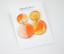 Glossy circle (gul/orange melerad)