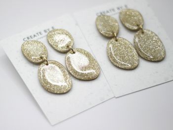 Glossy stone (guld/glitter)