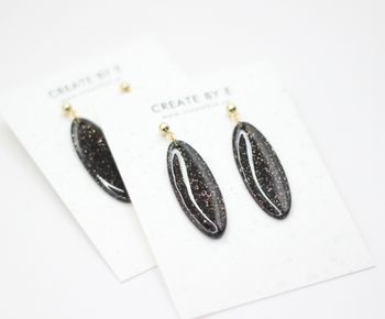 Oval (svartglitter/gloss)
