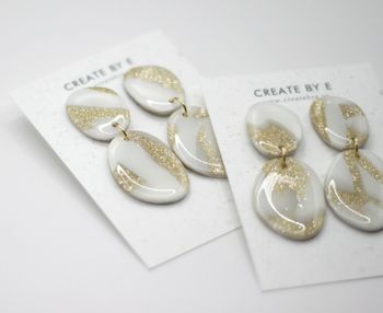 Glossy stone (vit/guldglitter)