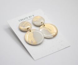 Glossy circle (vit/guld)