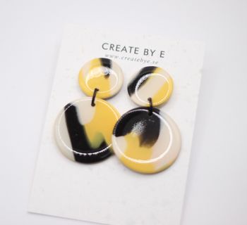 Glossy circle (gul/svart)
