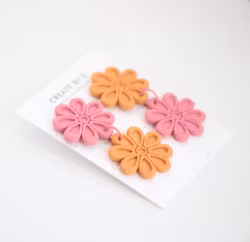 Blommor (rosa/orange)
