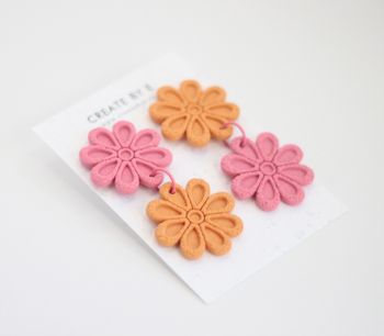 Blommor (rosa/orange)