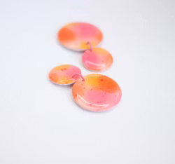 Glossy circle (rosa/orange)