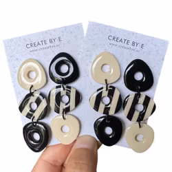 Dangle (svart/cremevit gloss)