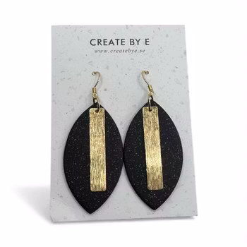 Mattsvart/glitter ”löv” guld