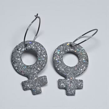 Kvinnosymbol på ring (silver/glitter)