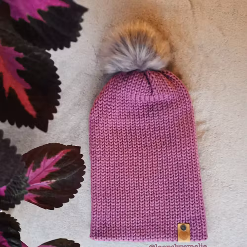 Dubbelstickad mössa med pompom