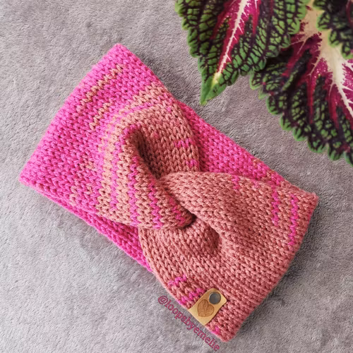 Dubbelstickat pannband med twist