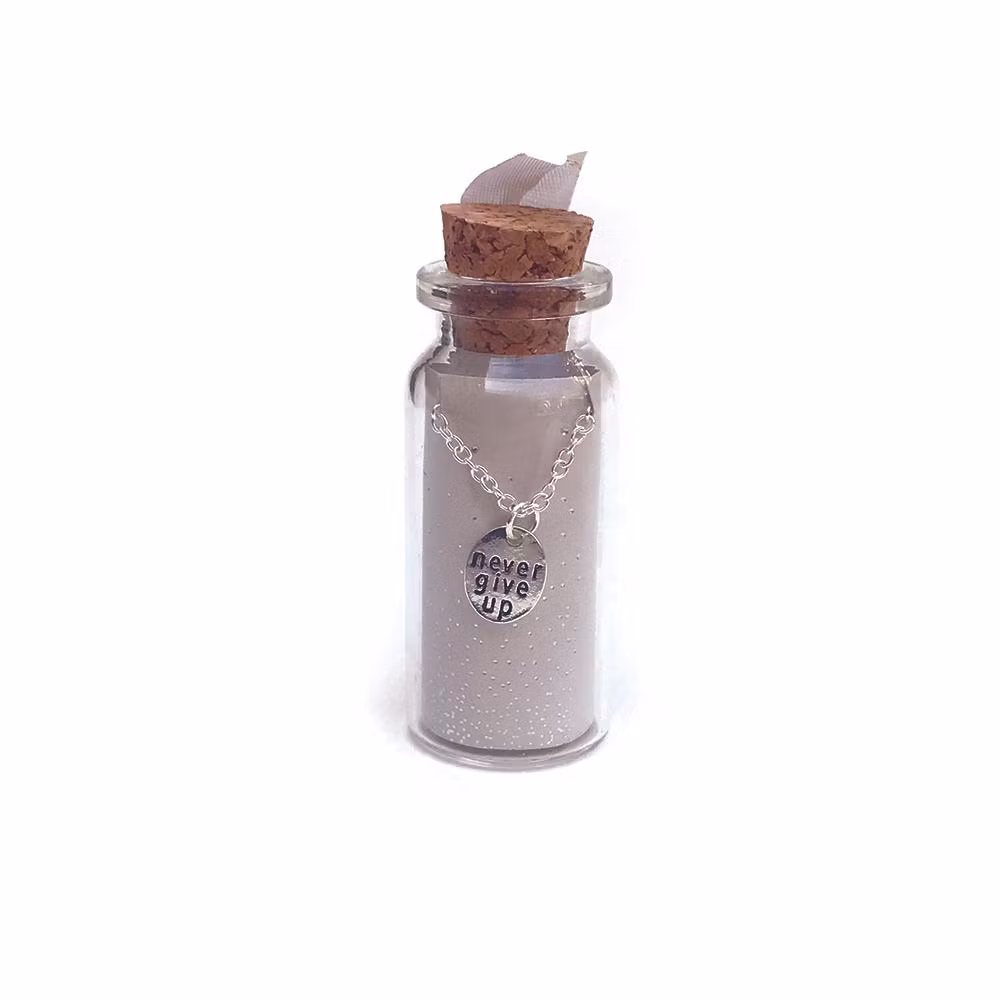 Lucky Feather - Message in a Bottle Necklace - "Never give up"