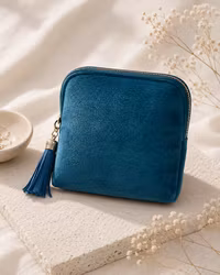 Elegant smykkepung i myk velur