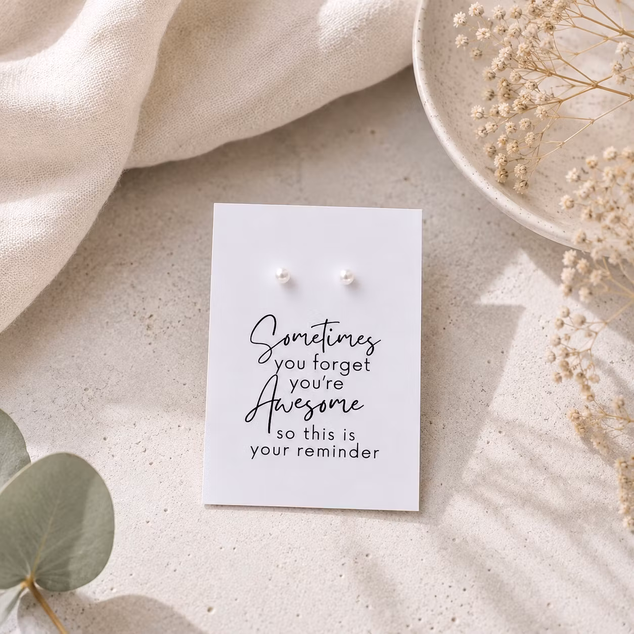 Smykkekort med perleøredobber