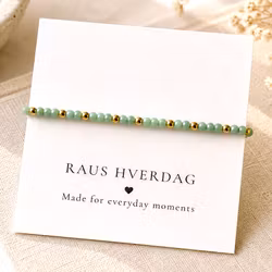 Armbånd med mintgrønne perler & gulldetaljer