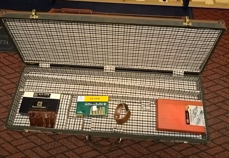 Kombigevär Merkel Mod 210E, Kal 12/6,5x57R, Hakmontage, Kikarsikte och vapenkoffert