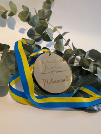 Medalj för att fira skolavslutning