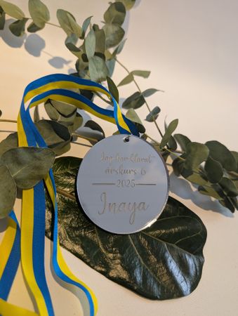 Medalj för att fira skolavslutning