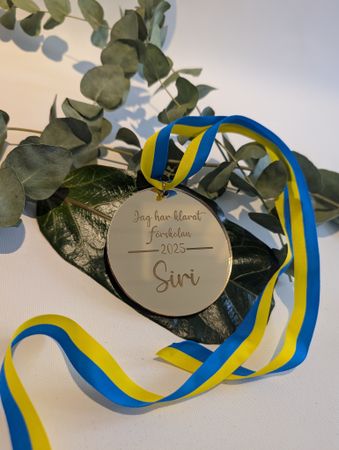 Medalj för att fira avslutning