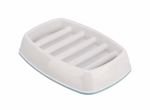 En vit grund slow feeder matskål för katter och hundar.