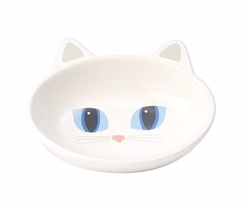 En vit kattmatskål formad som en katt.