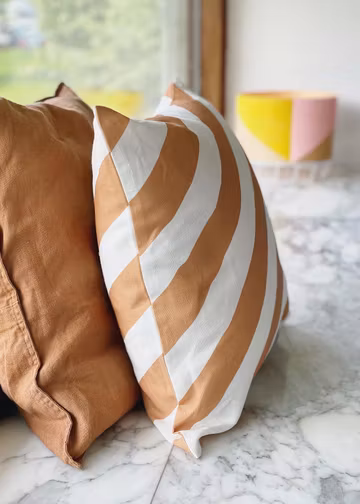 Polka caramel cushion