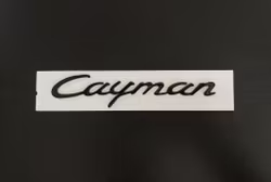 Porsche Cayman emblem i svart