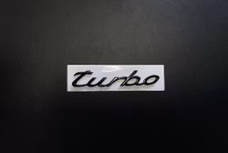 Porsche turbo emblem i svart