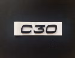 Volvo C30 emblem i svart