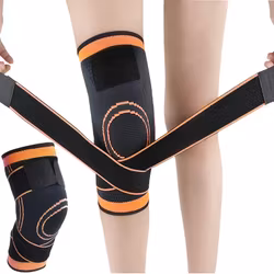 Knäskydd med stöd, kompression & spännrem, SVART/ORANGE