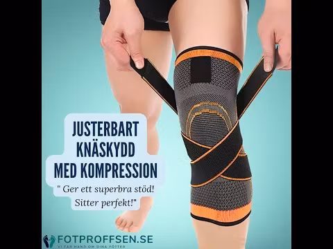 Knäskydd med stöd, kompression & spännrem, SVART/ORANGE