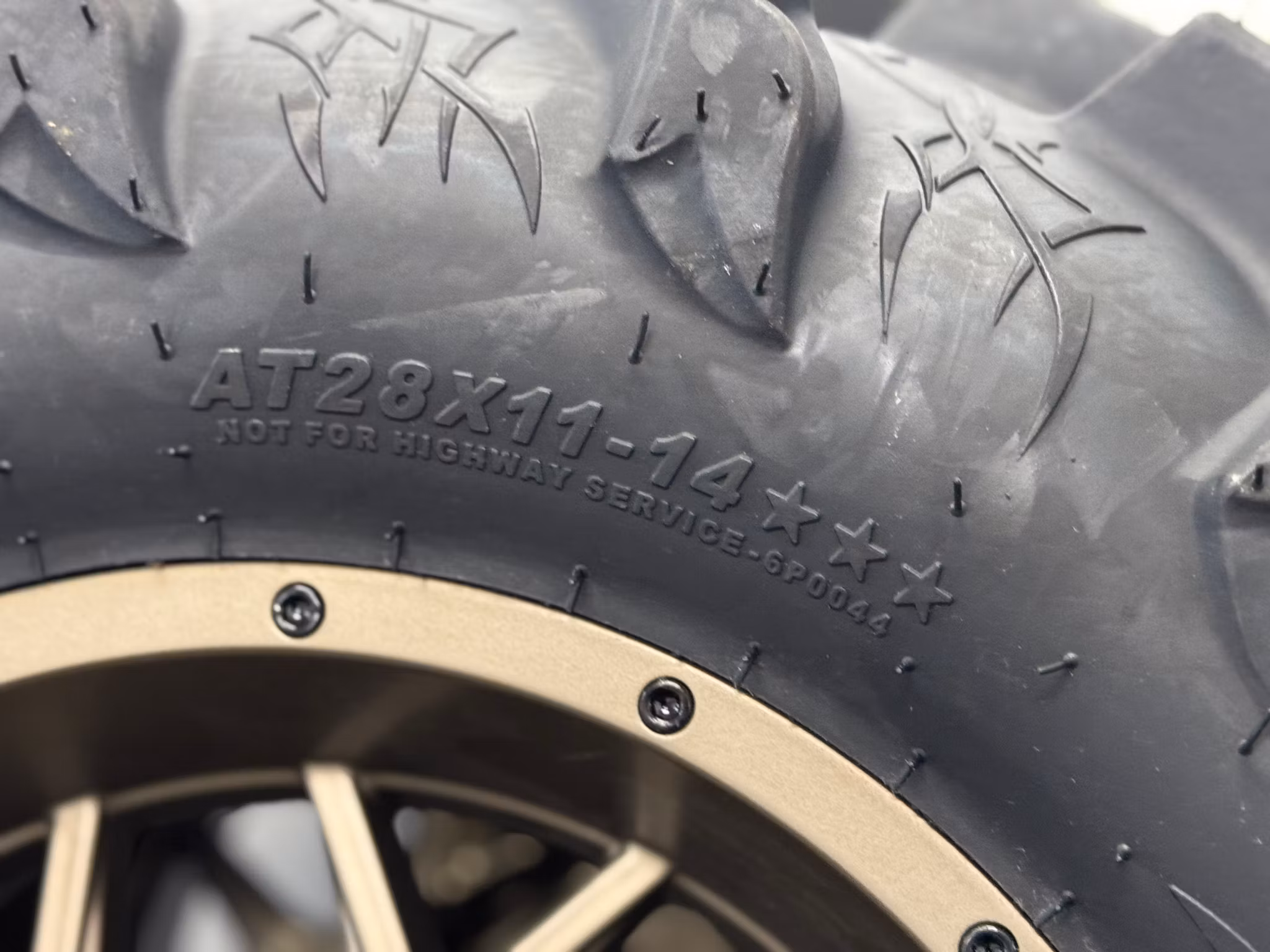 4x110 ITP Hurricane Bronze + ITP Mega Mayhem 28x14”