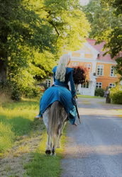 Sagolik Turkos klänning med långt släp