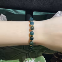 Armband - Mossagat - Rund - Guldpärlor