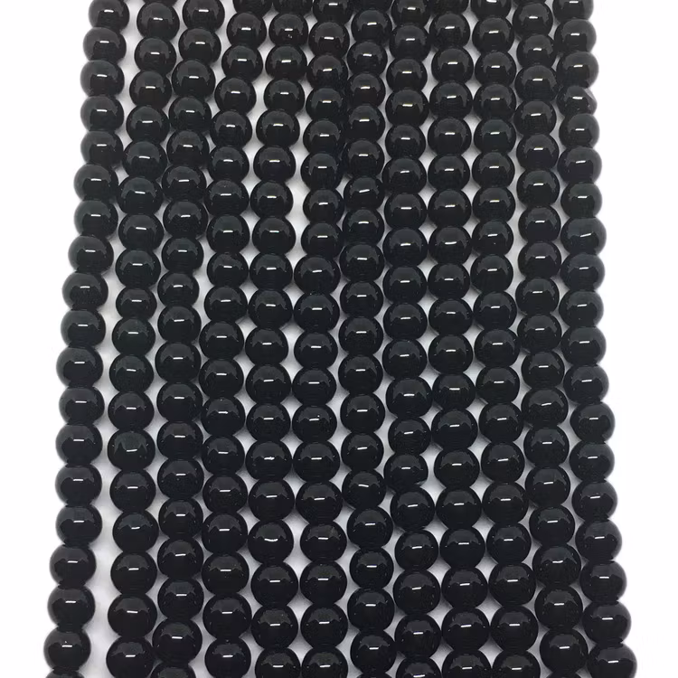 Vaxade glaspärlor 8 mm svarta
