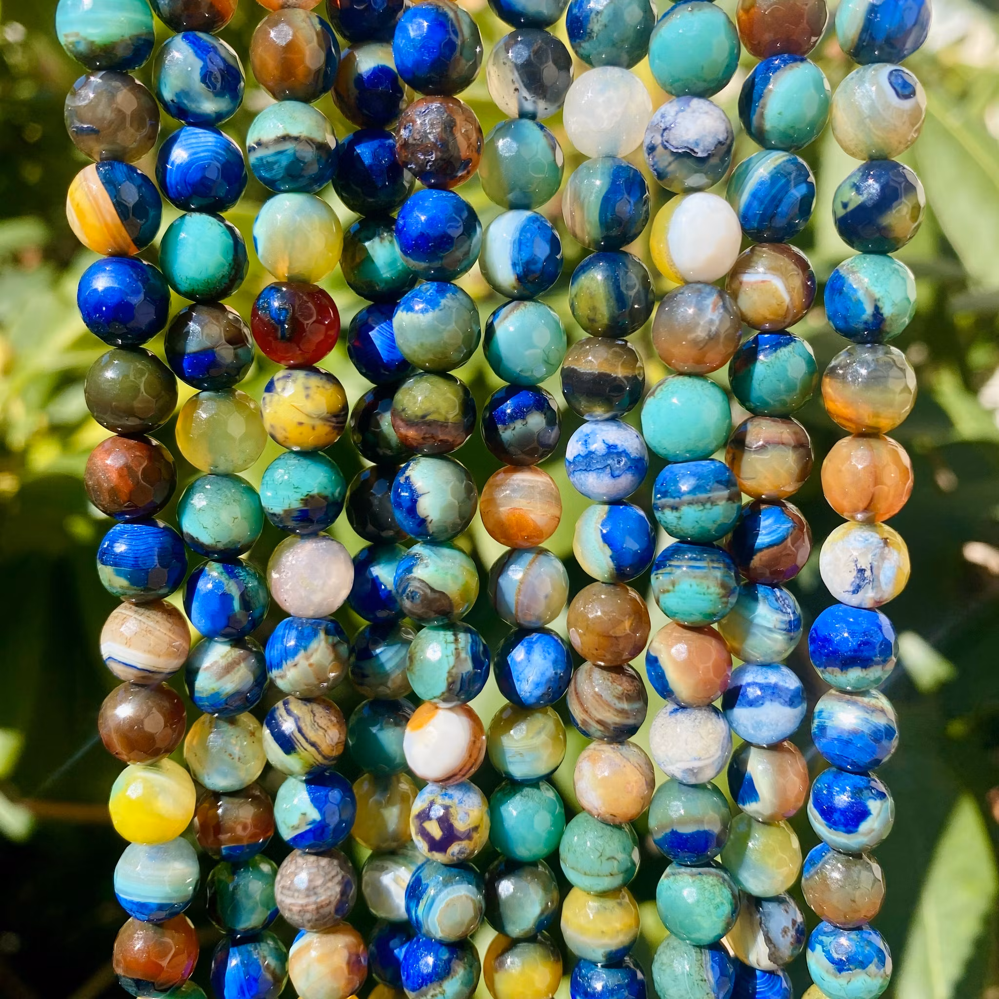 Facetterade agater 8 mm sea/dark blue