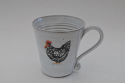 Mugg med svart höna